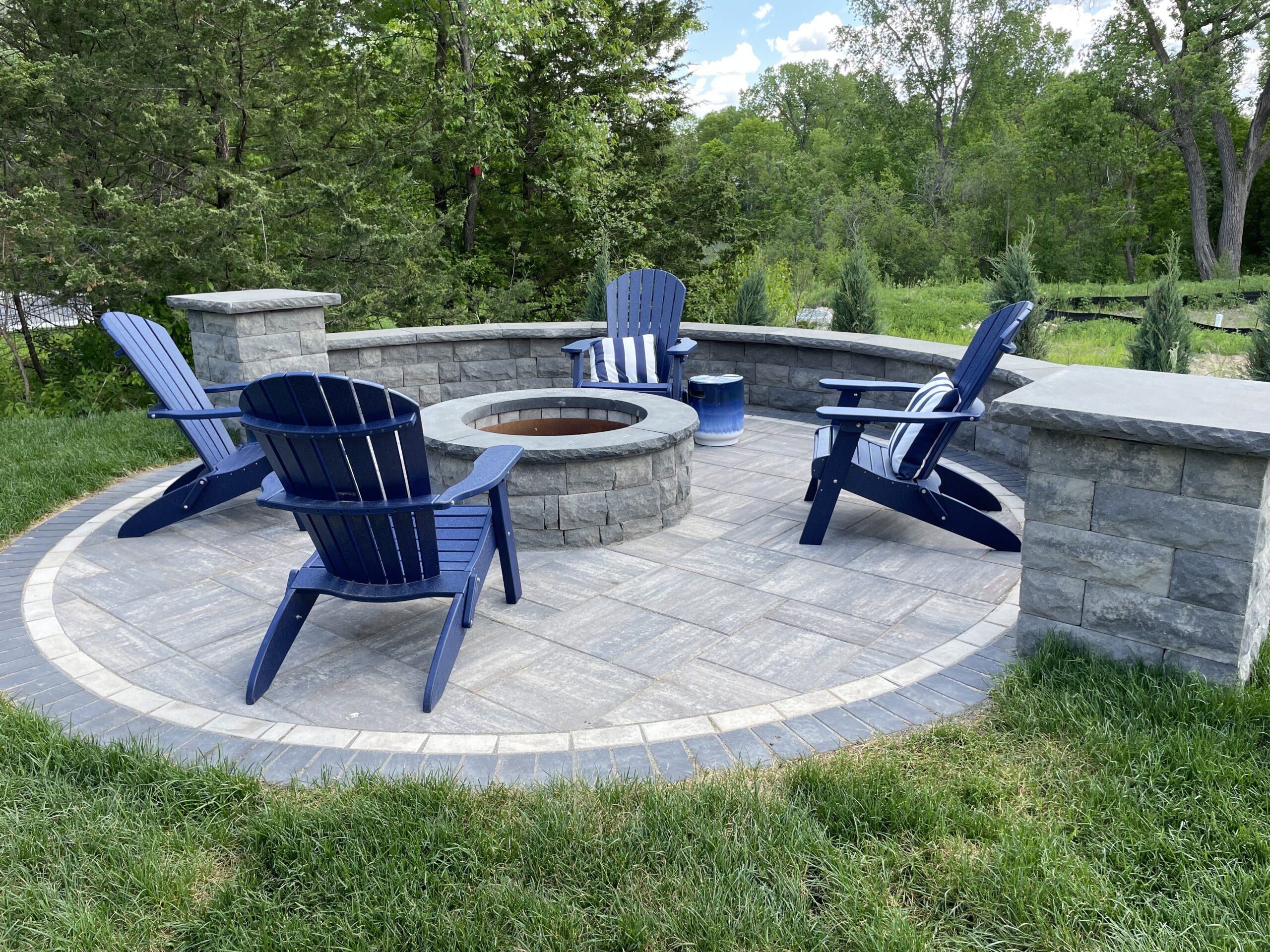 Patio and fire pit project by North Ridge Outdoor Services